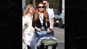 Read more about the article Lindsay Lohan Pushes Baby Stroller with Husband in Beverly Hills